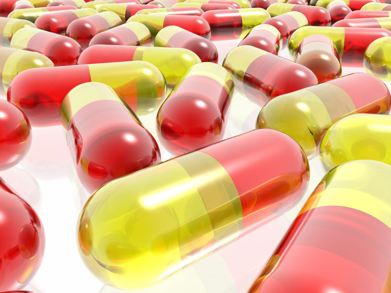 red and yellow pills on white background данные клинических исследований Триазавирина в отношении COVID-19