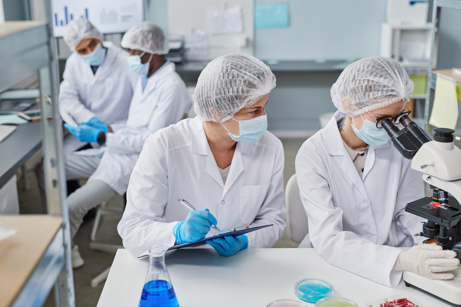 Women working in teamwork at the lab