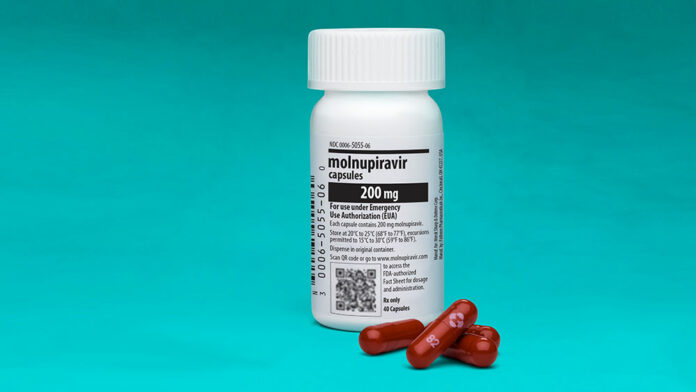 molnupiravir-bottle-with-capsules-teal Молнупиравир